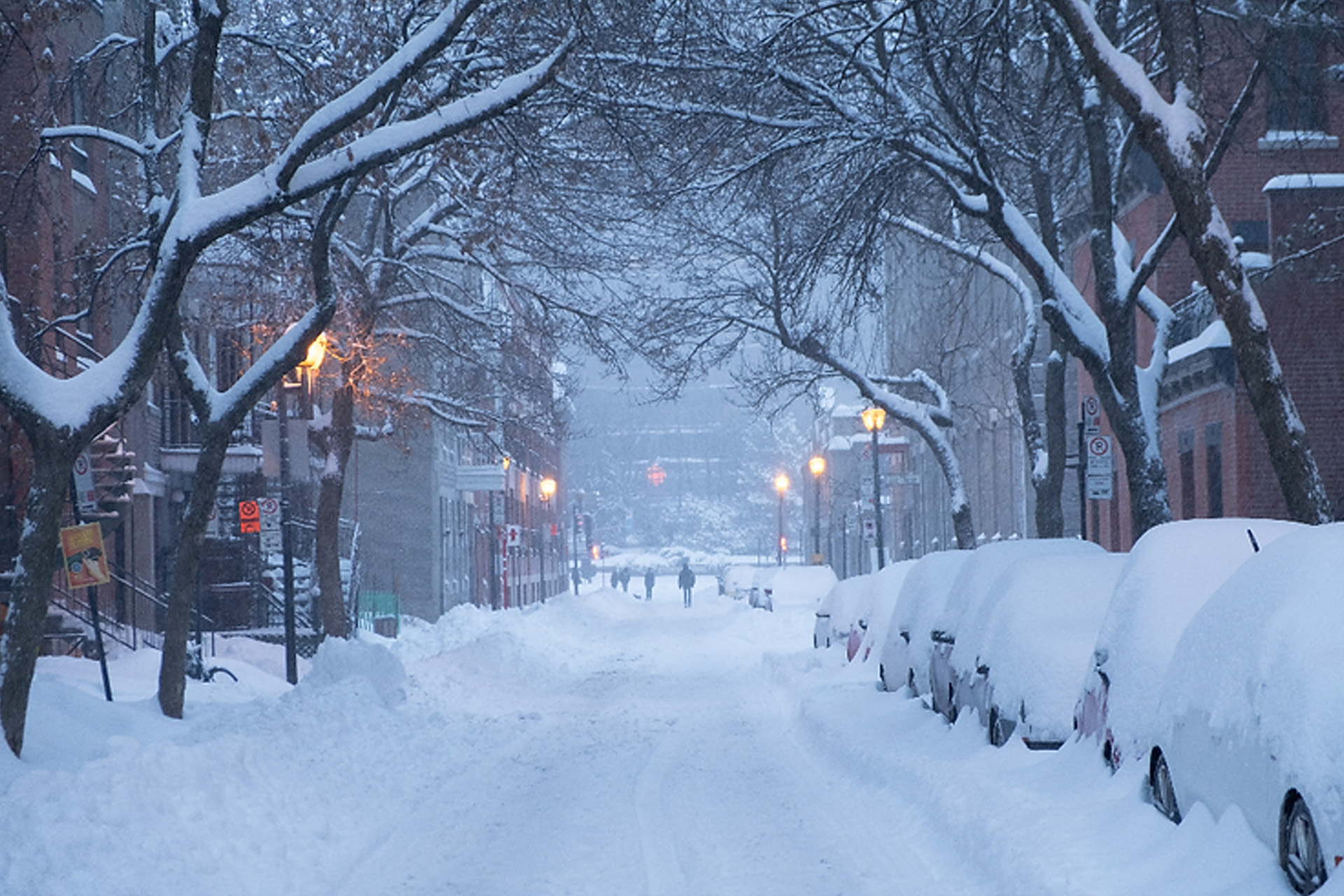 city street in cold climate after snowstorm