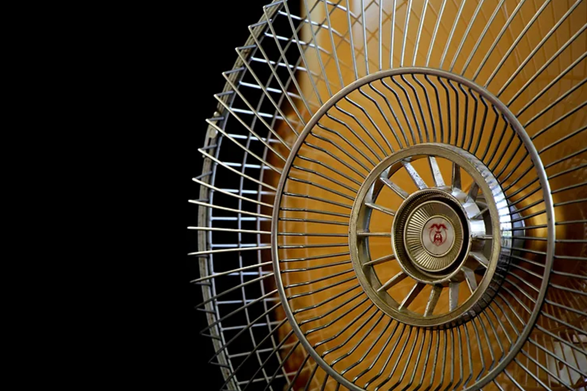 closeup of the grille on an old electrical fan