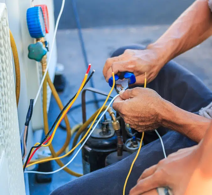 technician doing an ac repair