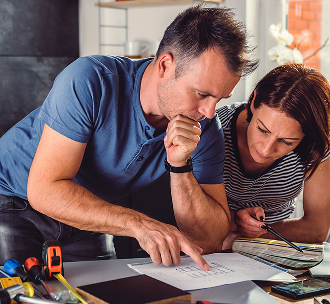 going over the plans during a free home comfort consultation