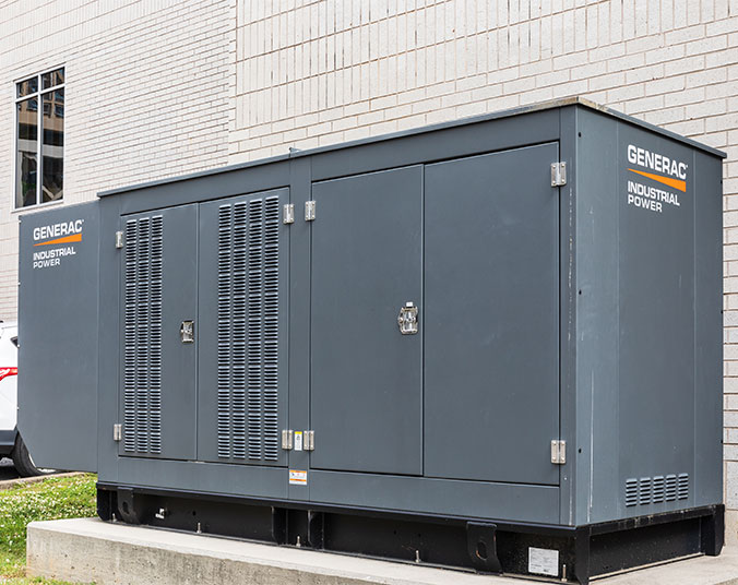 Generac industrial sized generator installed outside of building